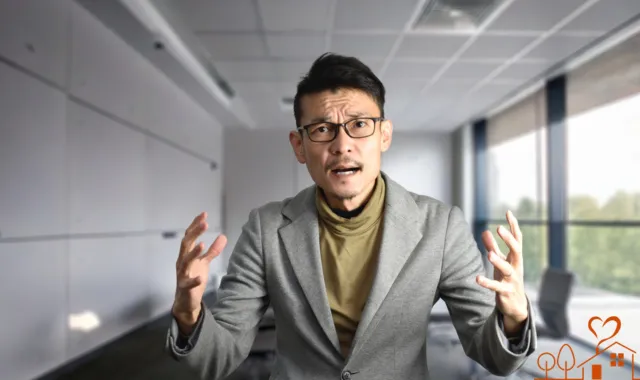 言い訳をする男